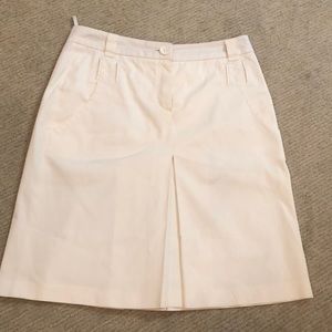 White Escade Sport skirt. Hits right above the knee and like a size 2